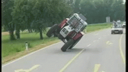 tractor-driving-stuns-two-wheels-13624216087.gif